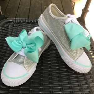 Silver sparkle sneakers with mint bows